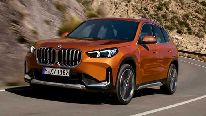 BMW X1 Driving in Orange