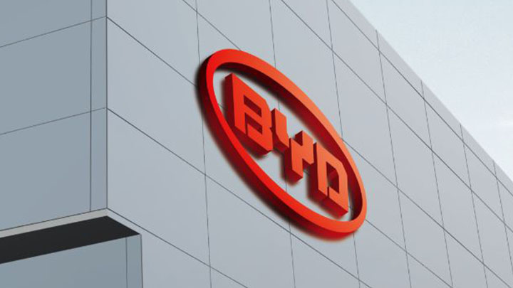 Red BYD logo on the side of a building