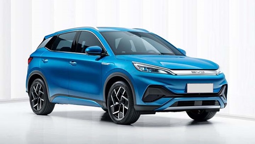 Blue BYD ATTO 3 parked in a white studio