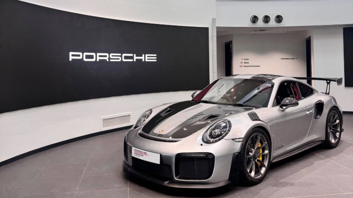 Silver Porsche 911 GT2 Exterior Front Inside Porsche Showroom