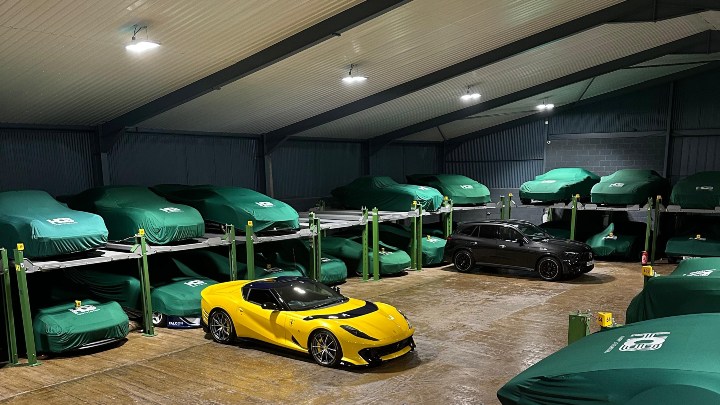 Yellow Ferrari inside Automotive Storage Hangar