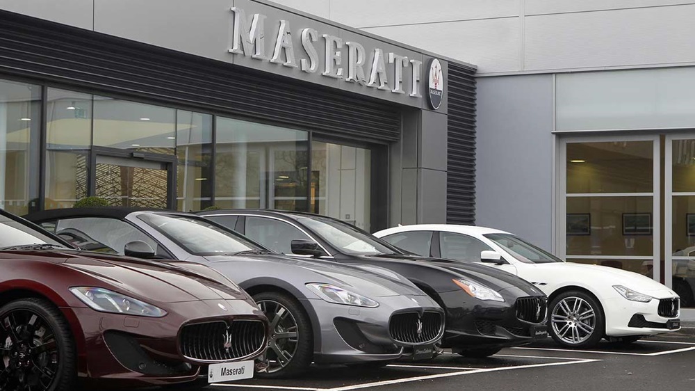 Row of used Maserati cars parked outside Maserati Colchester
