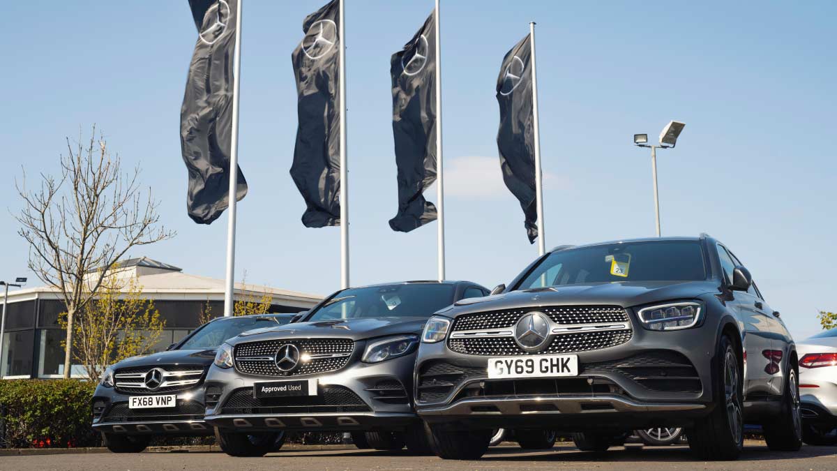 Mercedes of Ayr pitch with line of cars