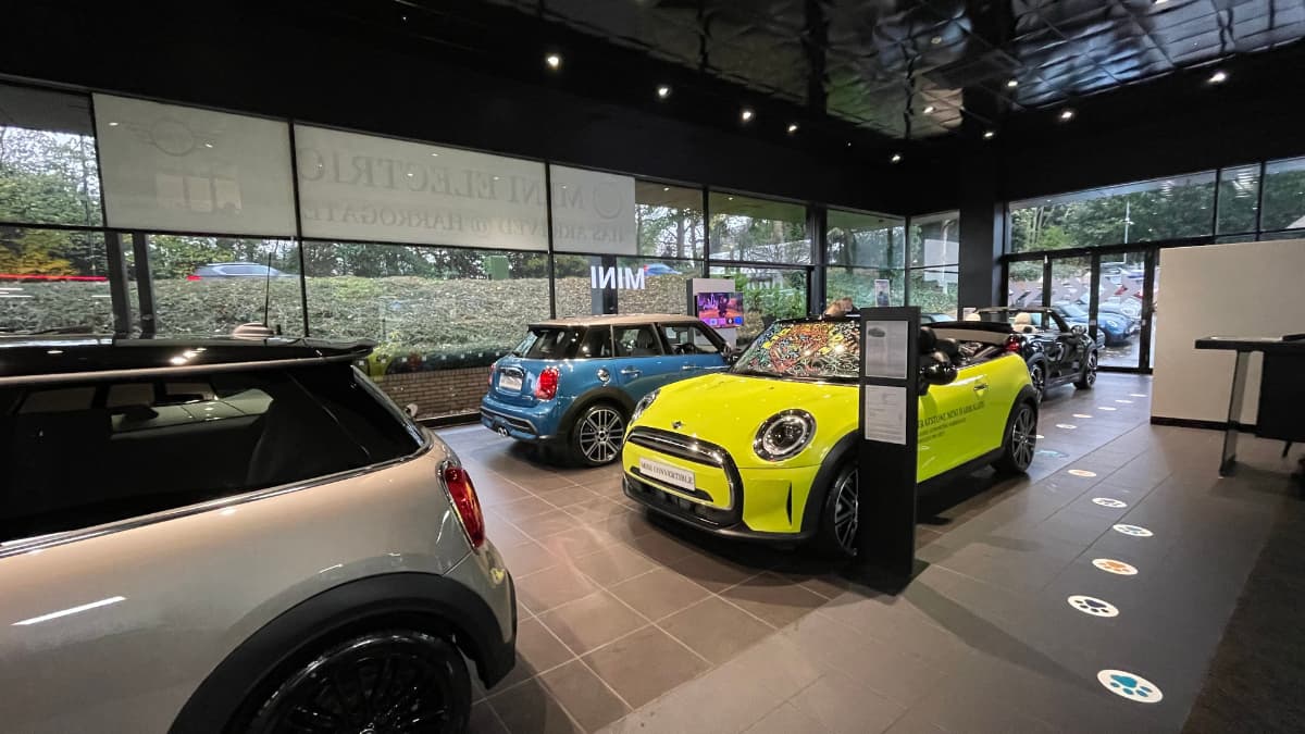 MINI Harrogate showroom with two cars parked next to eachother