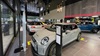 Wide angle image of Stratstone MINI Harrogate showroom and the cars