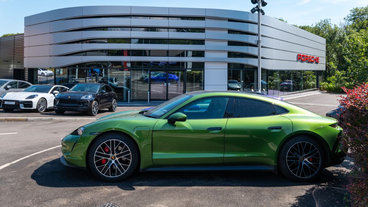 Porsche Wilmslow Dealership Exterior With Vehicle in Foreground