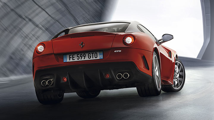 Red Ferrari 599 rear end studio shot