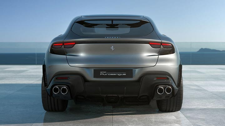 Rear parked shot of a grey Ferrari Purosangue