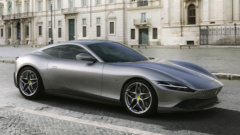 Front parked shot of a grey Ferrari Roma