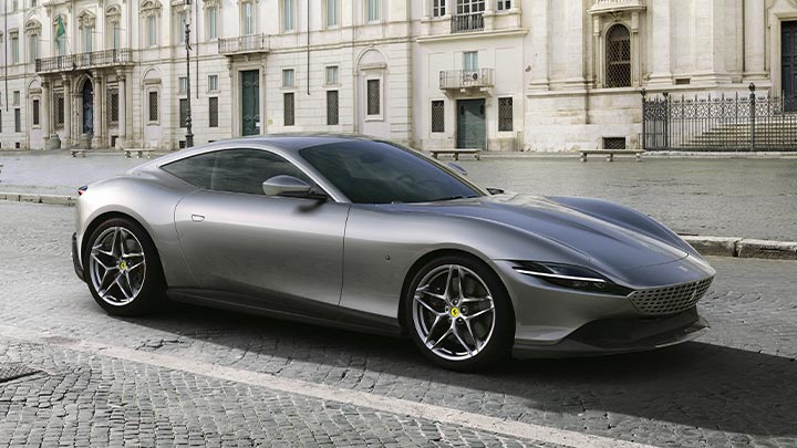 Front parked shot of a grey Ferrari Roma