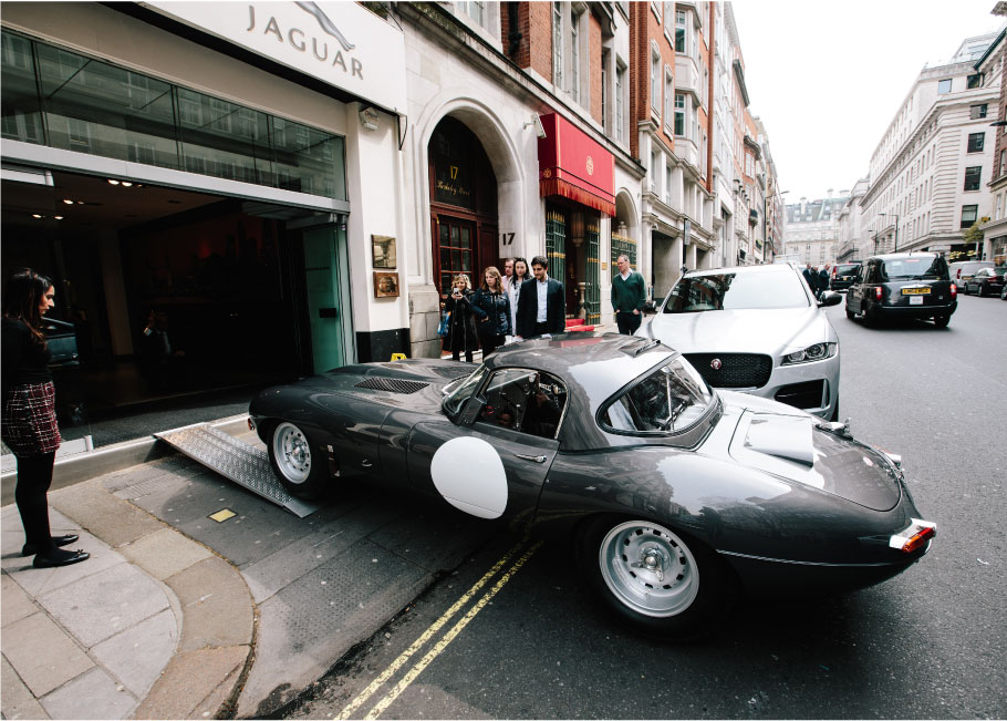Jaguar Lightweight E-Type driving into the Mayfair branch.