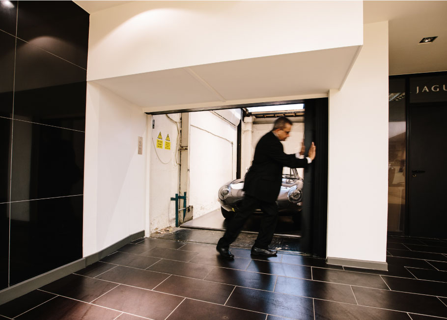 Opening the elevator for the Jaguar Lightweight E-Type.