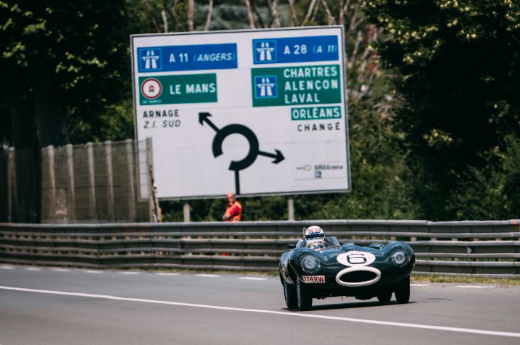 Jaguar Lightweight E-Type driving on the motorway.