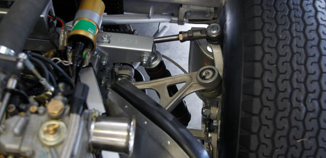 E-Type wheel and under the bonnet.