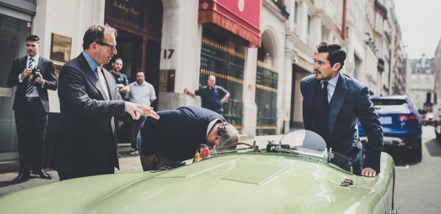 David Gandy getting in to the Jaguar C-Type.