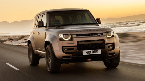 Silver Land Rover Defender Octa driving