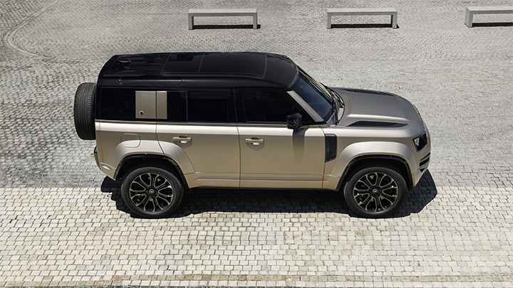 Aerial shot of silver Land Rover Defender Octa parked