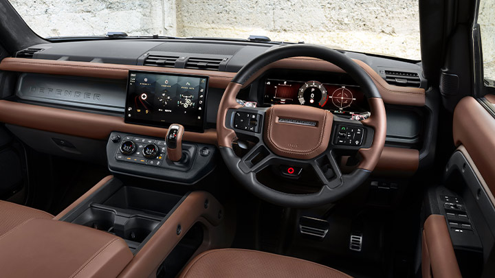 Close up of Land Rover Defender Octa's interior with brown and black leather