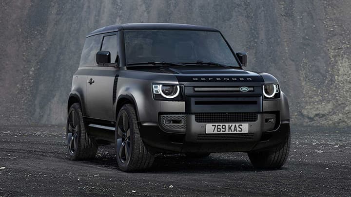 Black Land Rover Defender 90 render shot with mountain in background