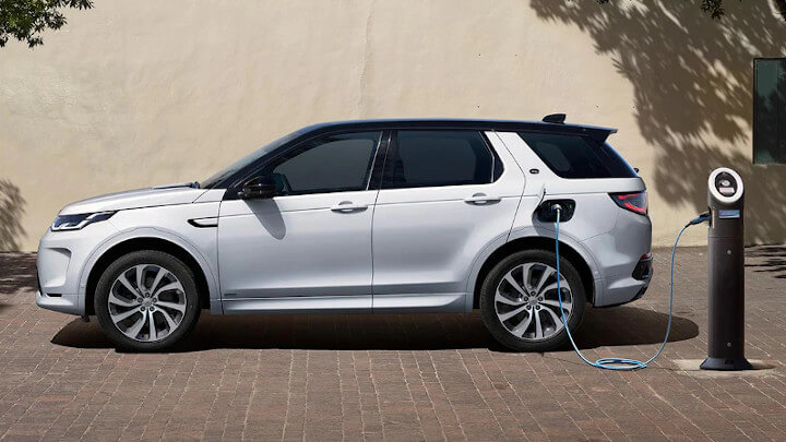 White Land Rover Discovery Sport Plug-In Hybrid Charging