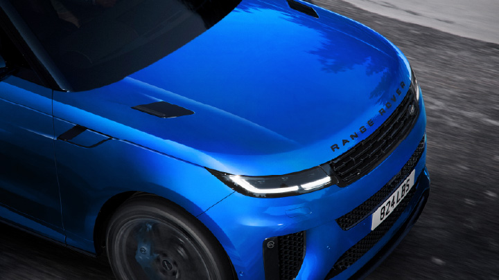 Range Rover Sport SV blue front close up aerial view