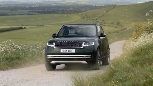 Range Rover Electric driving in countryside