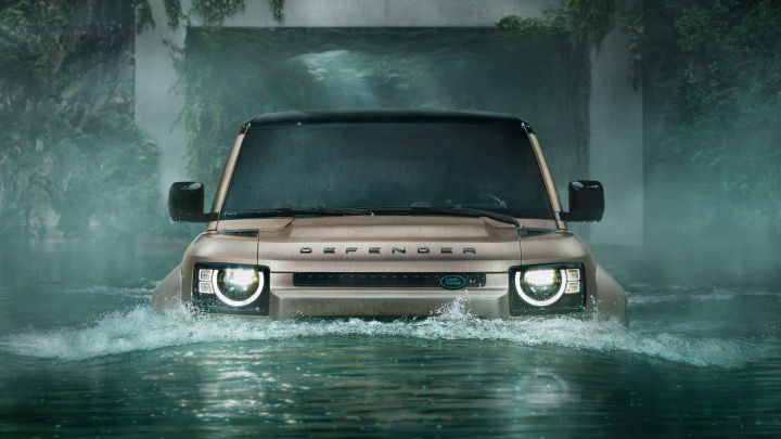 Land Rover Defender half submerged in water