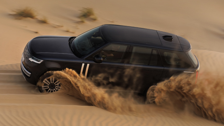 Land Rover driving in the desert
