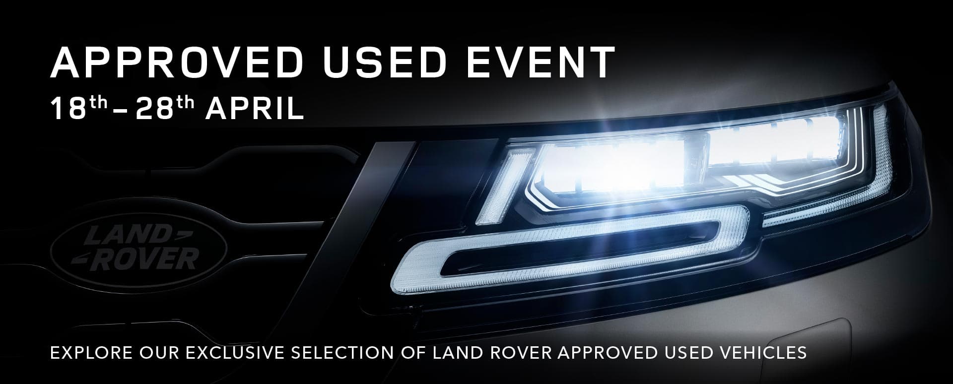 A Land Rover's car headlight lit up
