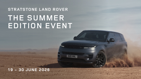 Grey Range Rover drifting on a deserted landscape. White promotional text overlay.