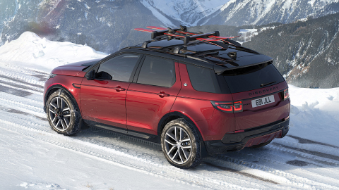 Land Rover Discovery Driving in Winter Landscape