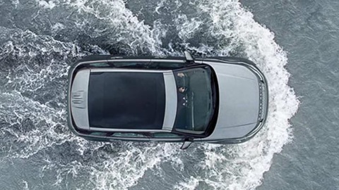 land rover evoque driving through water