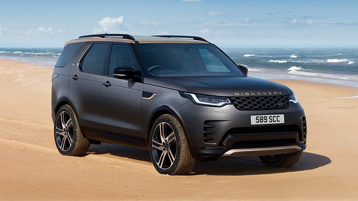 Dark Grey Land Rover Discovery On Beach Front
