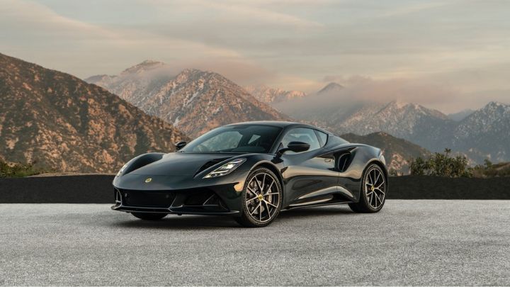 Balck Lotus Emira parked in the mountains