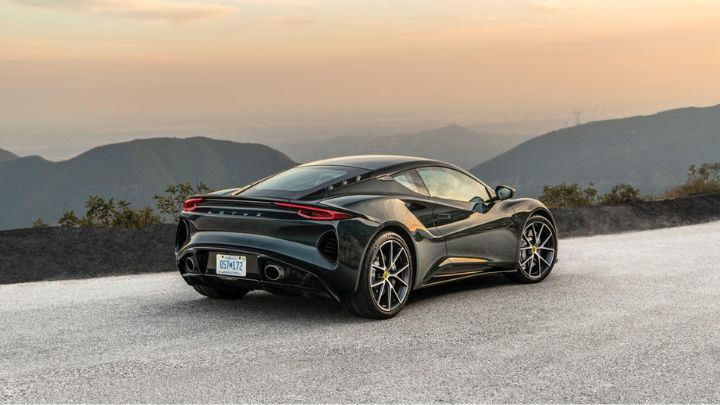 Balck Lotus Emira parked in the mountains