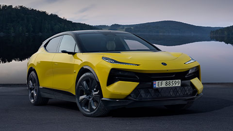 Front quarter shot of a parked yellow Lotus Eletre