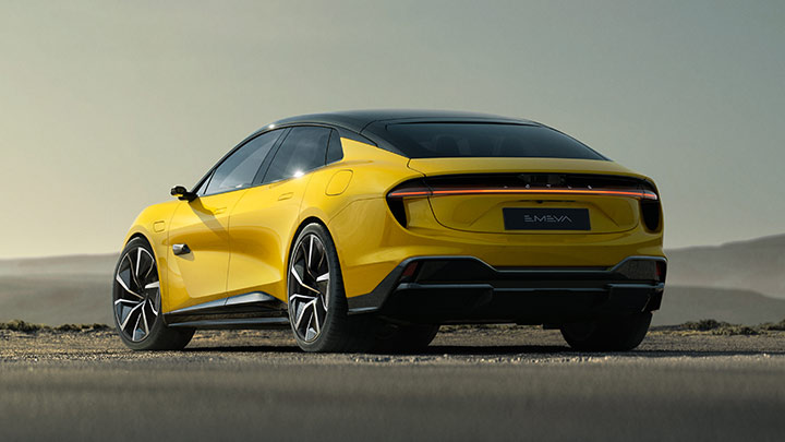 Rear quarter parked shot of a yellow Lotus Emeya