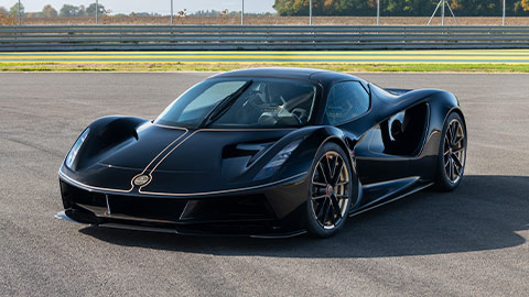 Black Lotus Evija parked on a racing track