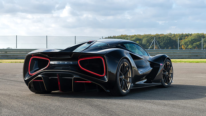 Close up of a Lotus Evija's rear end, whilst parked on a track