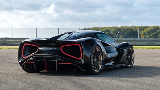 Close up of a Lotus Evija's rear end, whilst parked on a track