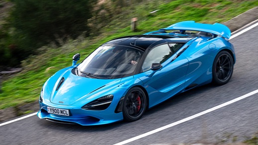 Blue McLaren 750S Driving On Road