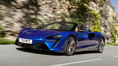 Blue McLaren Artura Spider Driving