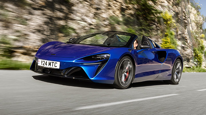 Blue McLaren Artura Spider Driving