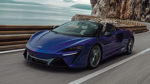Blue McLaren Artura Spider Driving