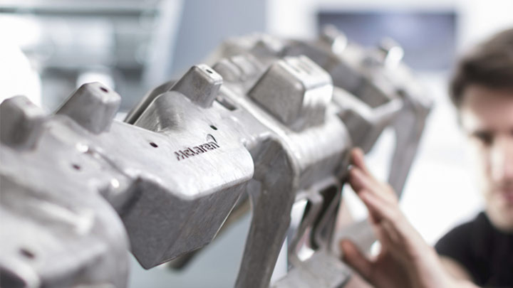 Technician Servicing a McLaren Engine