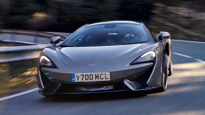 Grey McLaren 570GT Driving