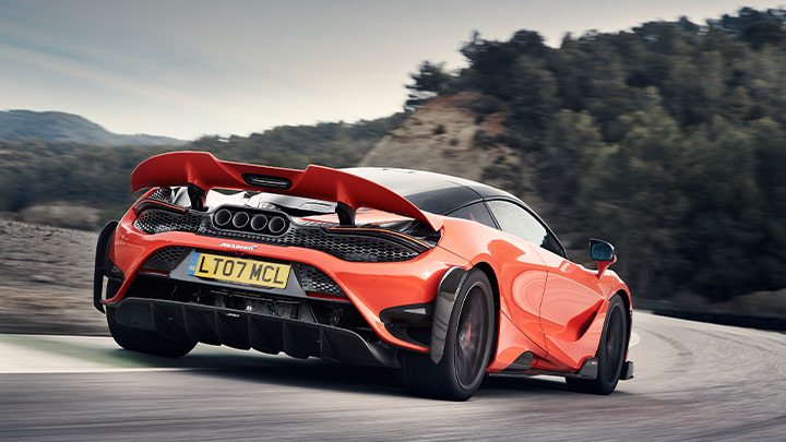 Rear Shot Of Red McLaren 765LT Driving On Track