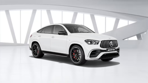 White Mercedes-Benz AMG GLE Coupe car in white warehouse background