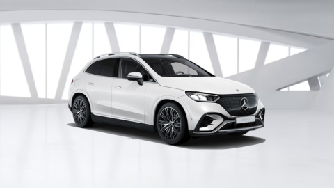 White Mercedes-Benz EQE SUV car in white warehouse background