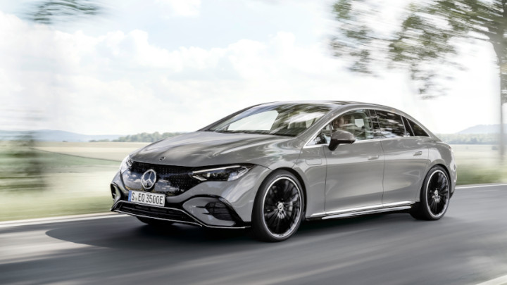 Grey Mercedes-Benz EQE Side Driving